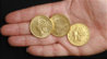 Gold coins cashed at bank.jpg