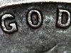 Clown face inside the letter O in a 1958 Lincoln cent.jpg