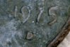 1975 penny with crooked 5 smushed.jpg