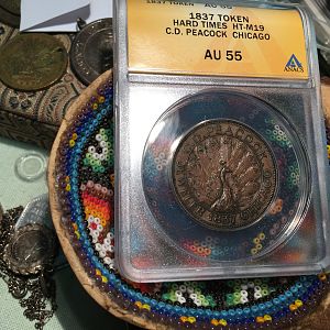 1837 Hard Times Token-C.D. Peacock of Chicago