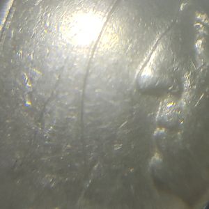 Circle around face, goes up to head