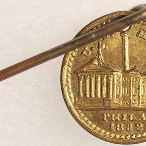 A Soley Token Sold on a Stick Pin!