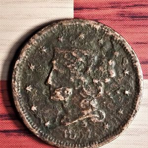 1857 (small date)