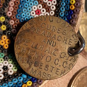 Phenyo-Caffein Puzzle Token from the 1890's-Obverse