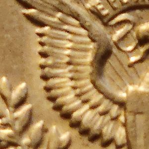 1964-d half dollar reverse left wing