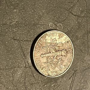 Dime reverse cladding error?