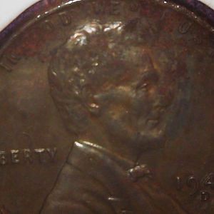 toned steel cent in change front