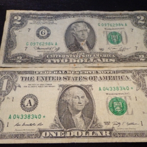 1976 $2 REGULAR AND 2009 $1 STARRED