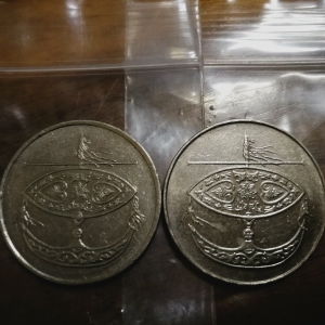 Behind coins