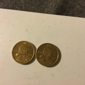 Two differently colored 2000 p dollar coins