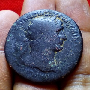 Only for experts and owners of knowledge This ancient Roman coin how much it is priced .. And what is the name of the Roman emperor