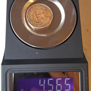 1971D Orphan Quarter on scale