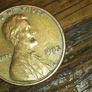 1982 penny with various defects