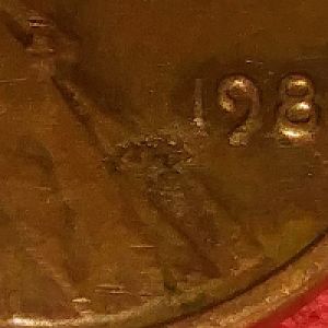 1982 penny with various defects