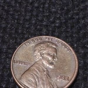 1982 penny with various defects