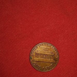 1982 penny with various defects