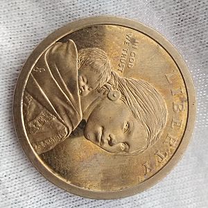 Alignment of  off and bars across edge of bottom coin and doubling stars on top