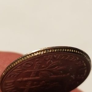 1991 p Dime error on RIM and Off-center