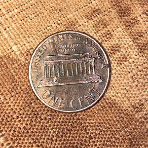 1982 penny over canadian coin
