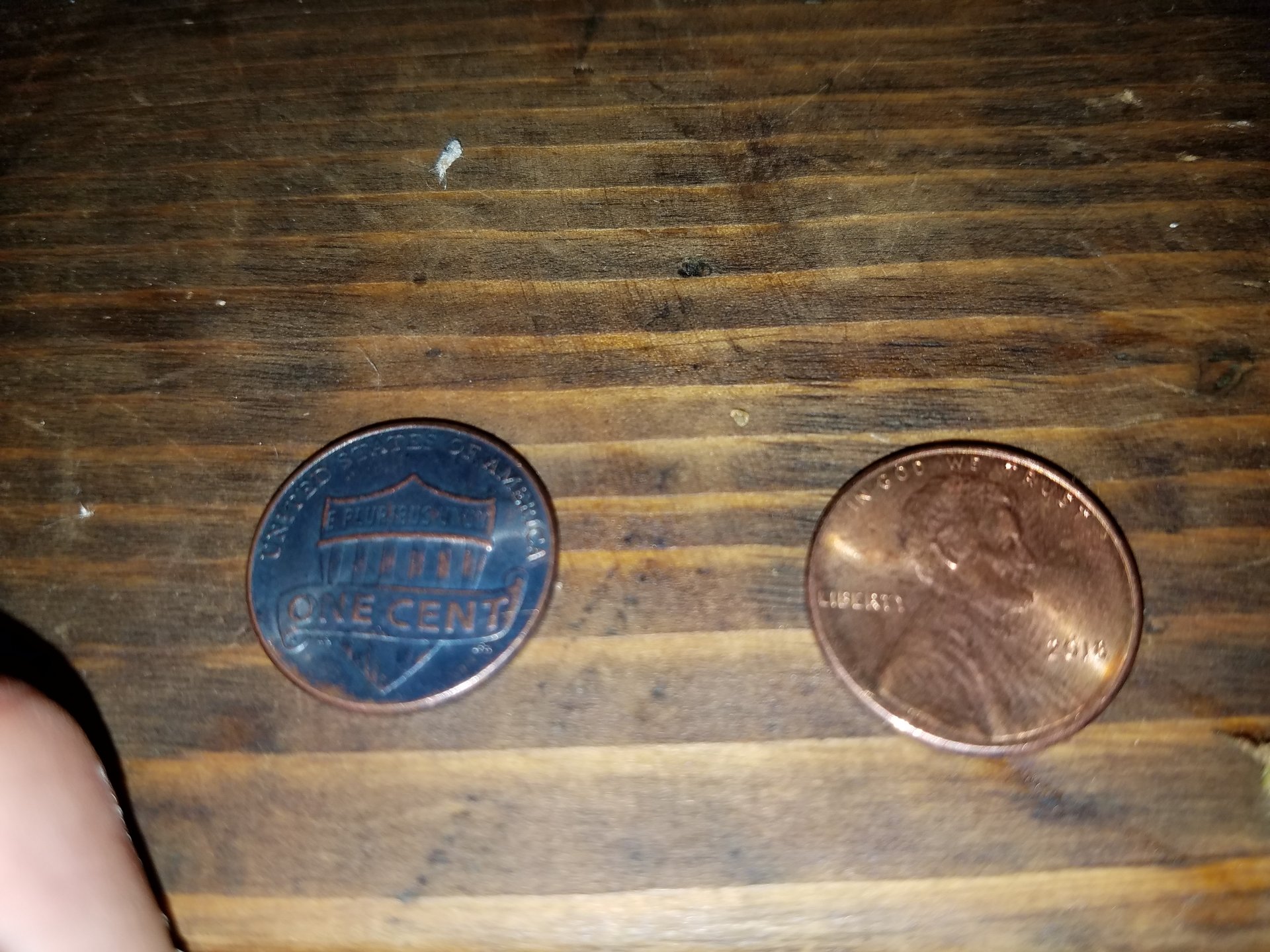 I have here looks to be 2 2018 error pennies but I need more info please help