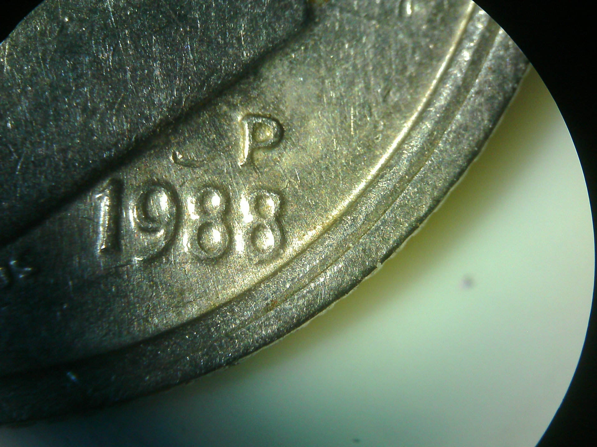 Left Lens Obv. 1988 P offcenter obv.