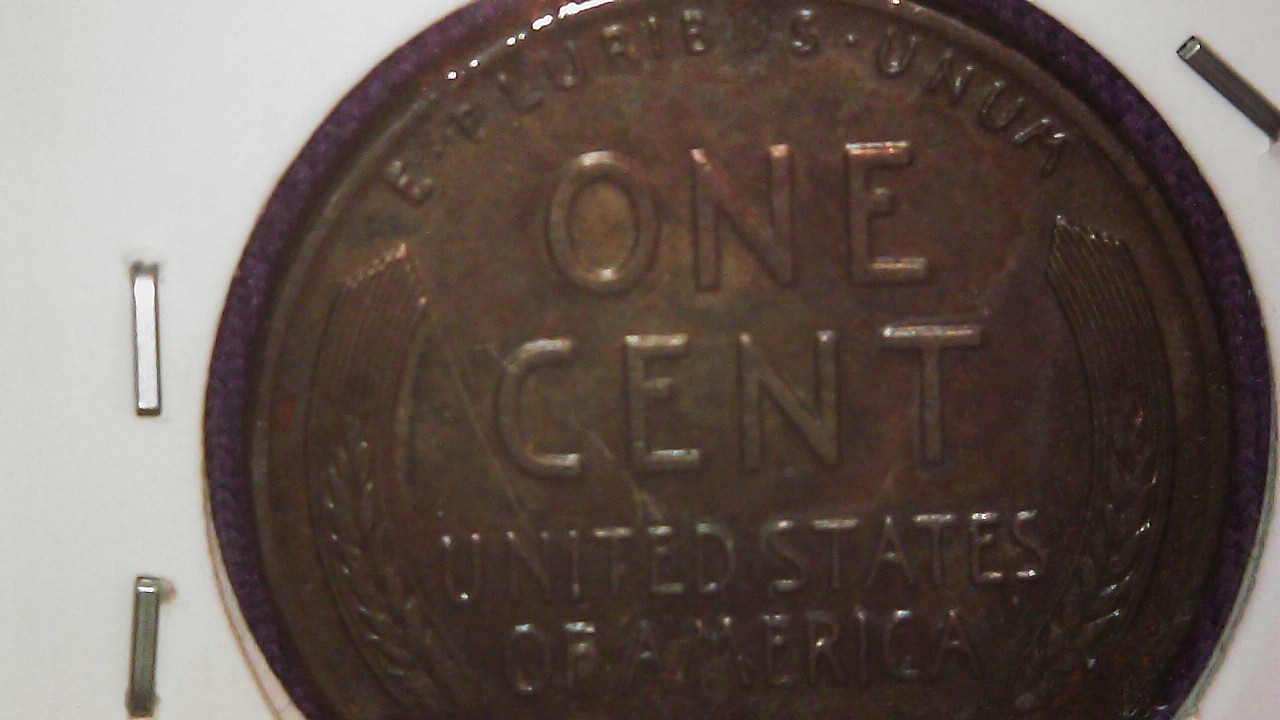 toned steel cent in change back