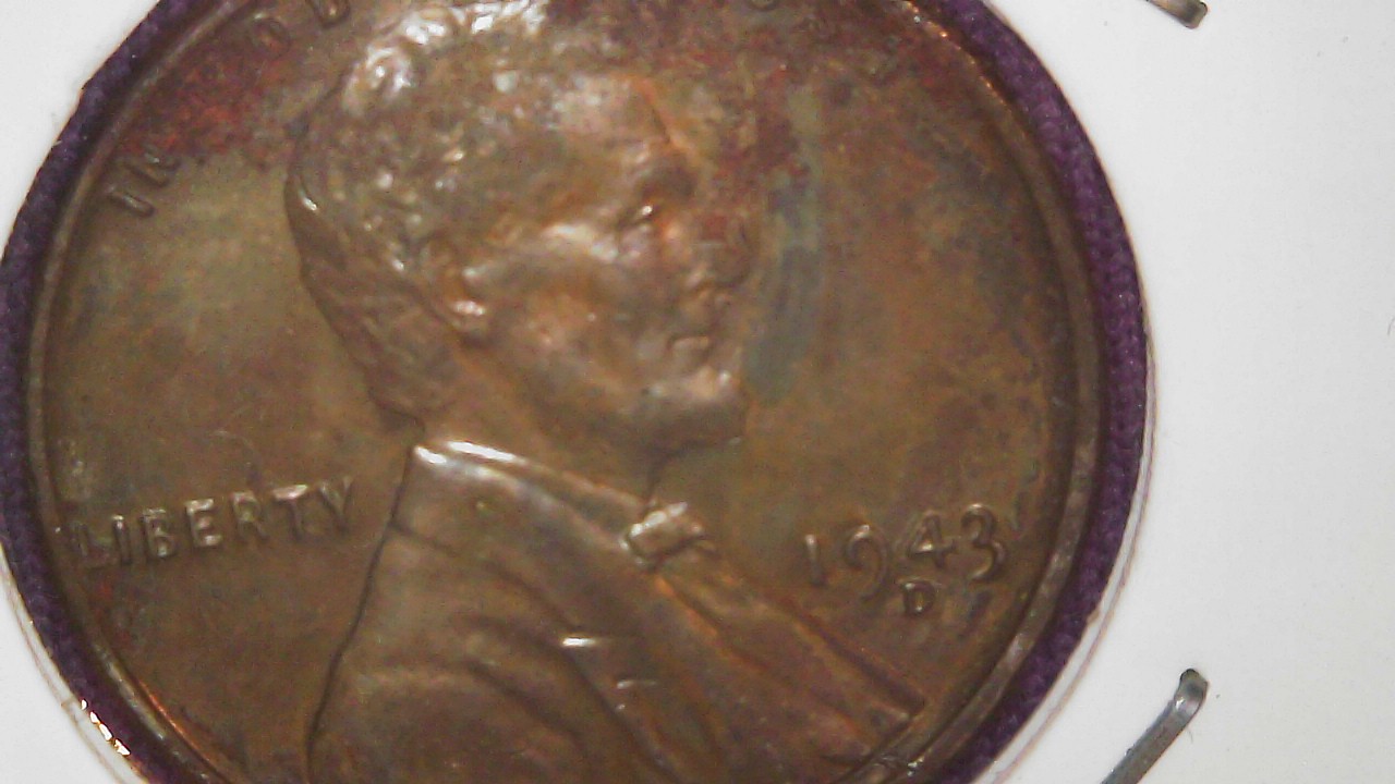 toned steel cent in change date