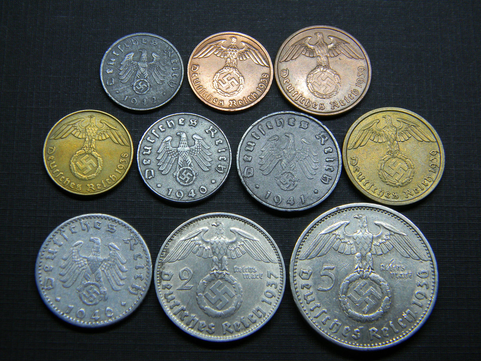 Сколько стоит фашистская монета. Монеты рейха. Монеты нацистской Германии. Монеты третьего рейха. Монеты третьего рейха гурт.